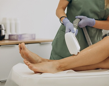Indian woman receiving diode laser treatment