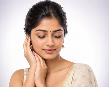 Indian woman receiving glow facial treatment